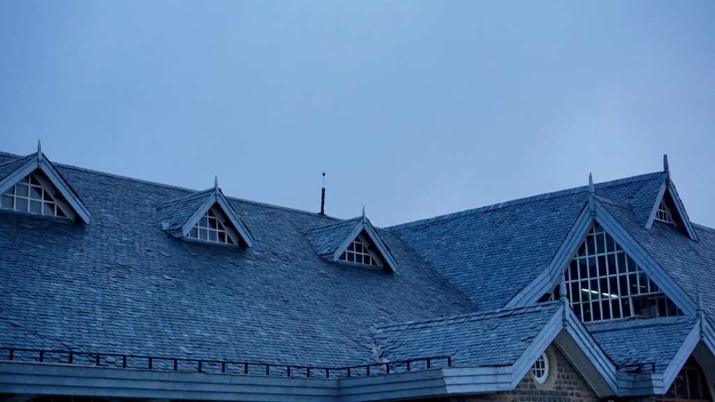 Rooftop of a residential house on a winter evening.